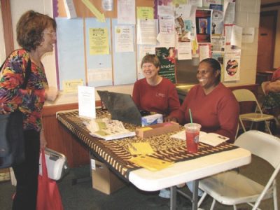 Marie Hansen and Susan Harris at the Welcome Table